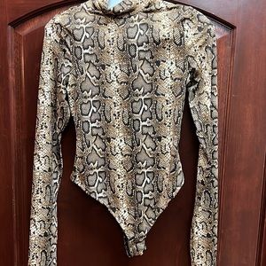Snake skin bodysuit size small matching skirt available in closet
